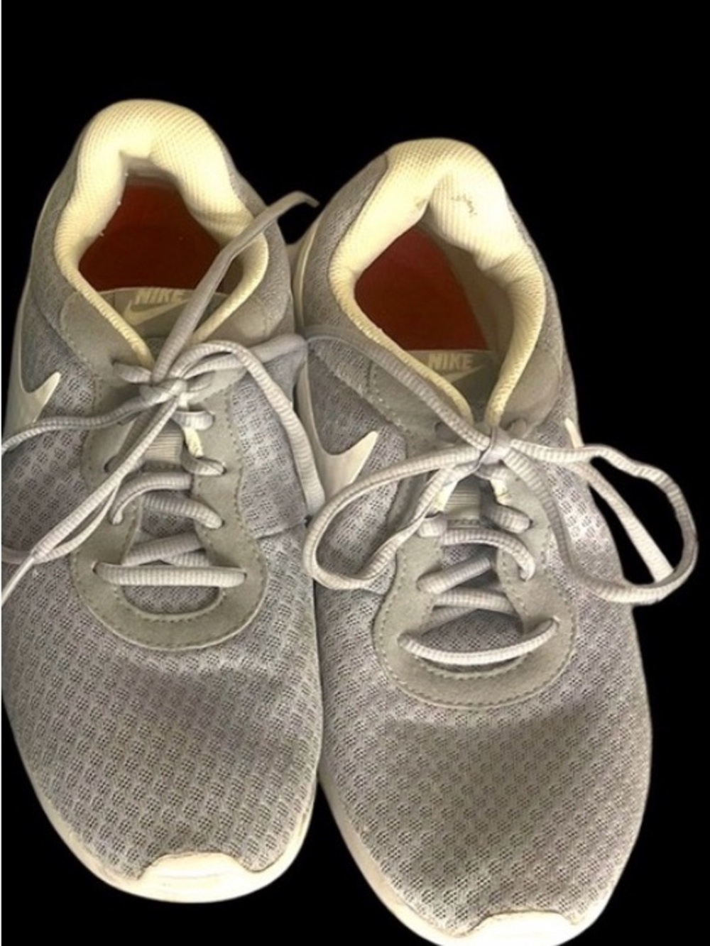 Gray and white Nike sneakers size 8